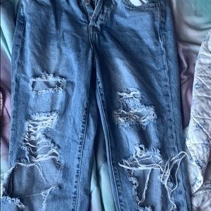 baggy ripped jeans,there a 00 but fit like a 0,goes well with anything